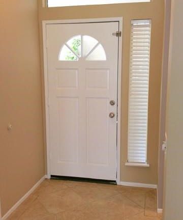 Entry with beautiful new tile and paint