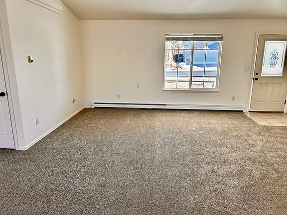 Living room looking at front door.