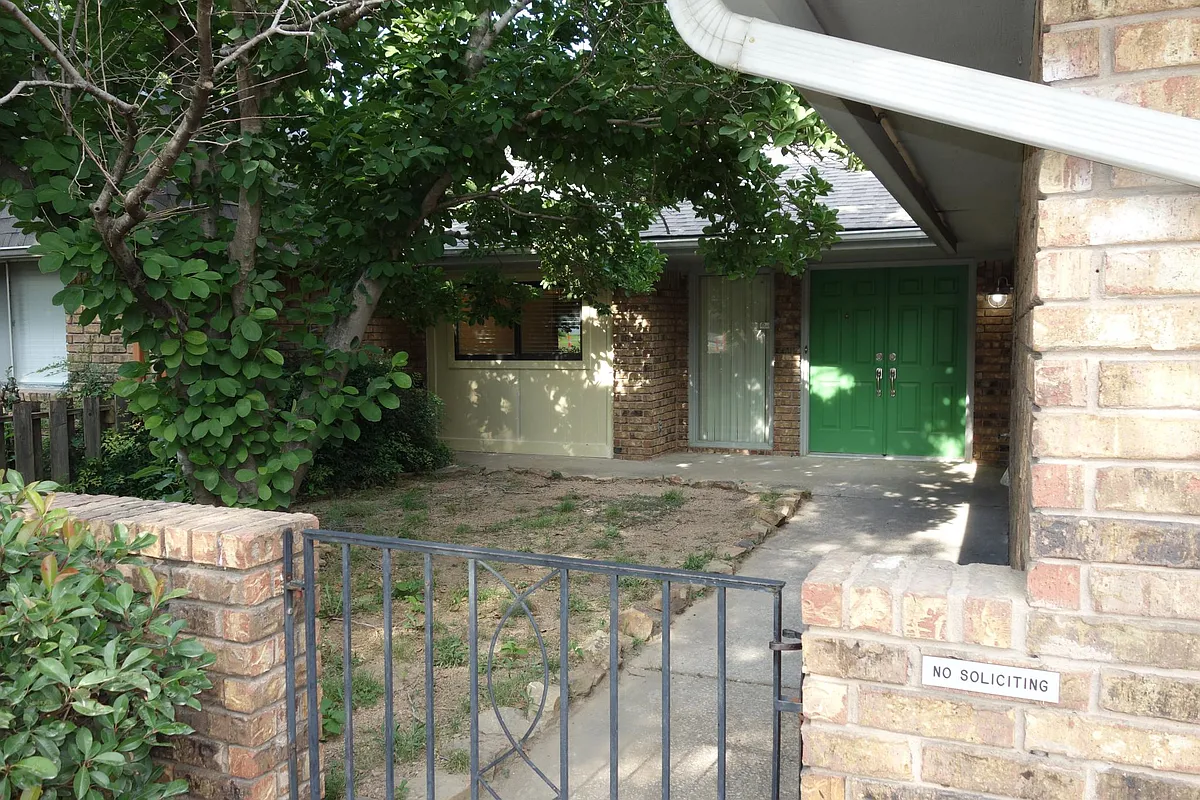 Gated Front Courtyard
Double Front Door Entry - 7117 S Indianapolis Ave