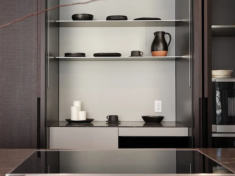 Custom Soft-Close Drawer with Built-In Organization _ Designed for both functionality and elegance, this integrated storage solution features rich wood dividers, smooth soft-close mechanisms, and a seamless fit within the sleek kitchen cabinetry.