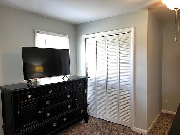 Dresser, TV and closet