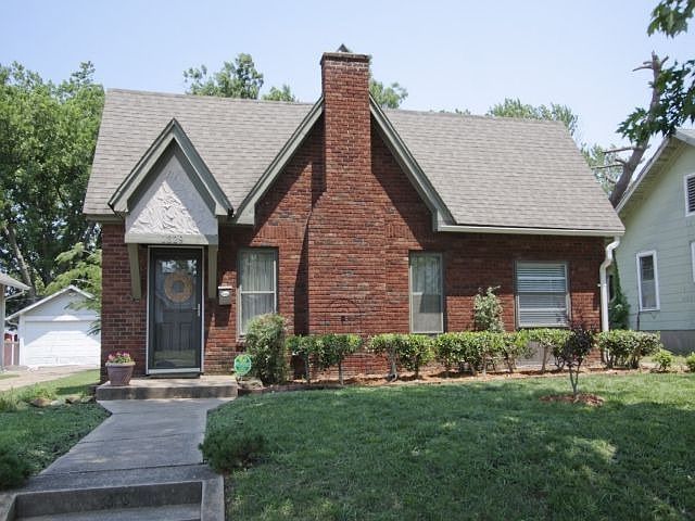 Charming Cottage Brick Home located in popular Midtown.