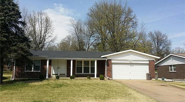 WELCOME HOME - brick and vinyl exterior, 2 car garage and much more