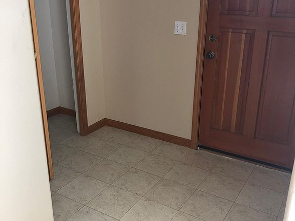 Front door/entry and coat closet.