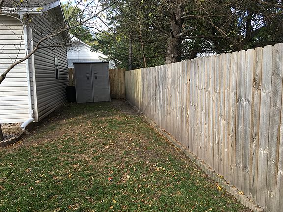 Shed behind garage
