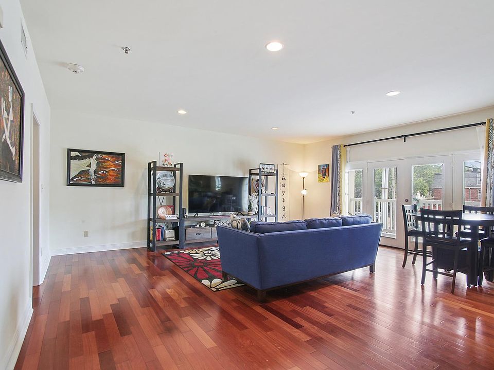 The living areas and bedrooms have beautiful wood floors.