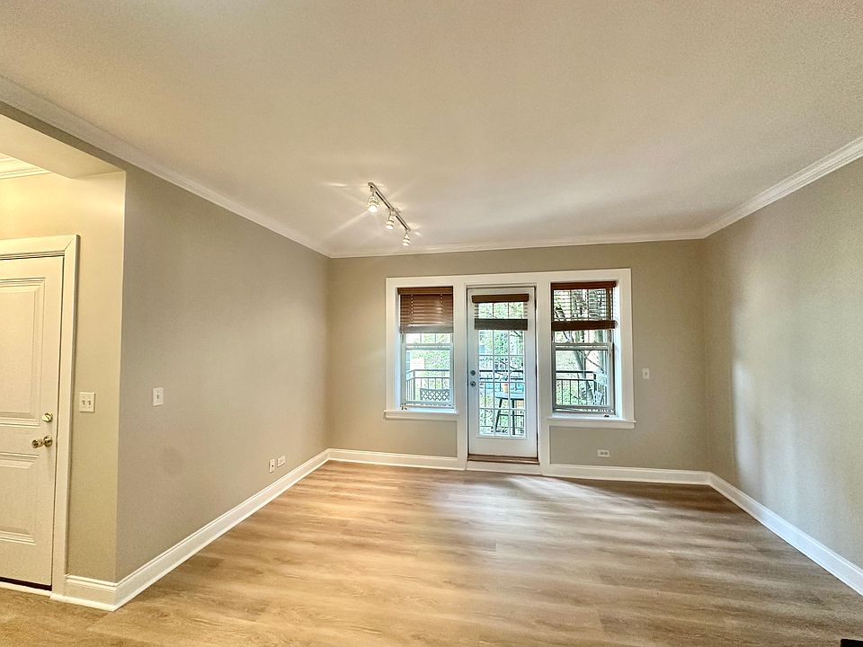 Entire unit painted and new floors! Enjoy your private balcony from the living room.