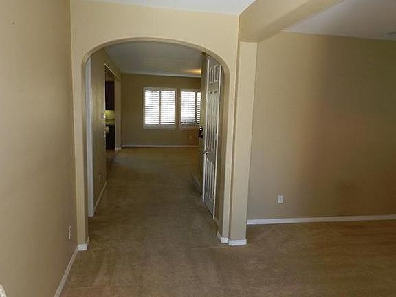 Entryway from Front Door. Carpet replaced by hardwood flooring.
