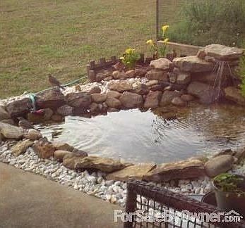 Pond and waterfall : Enjoy robins, cardinals, and doves playing in the patio pond.