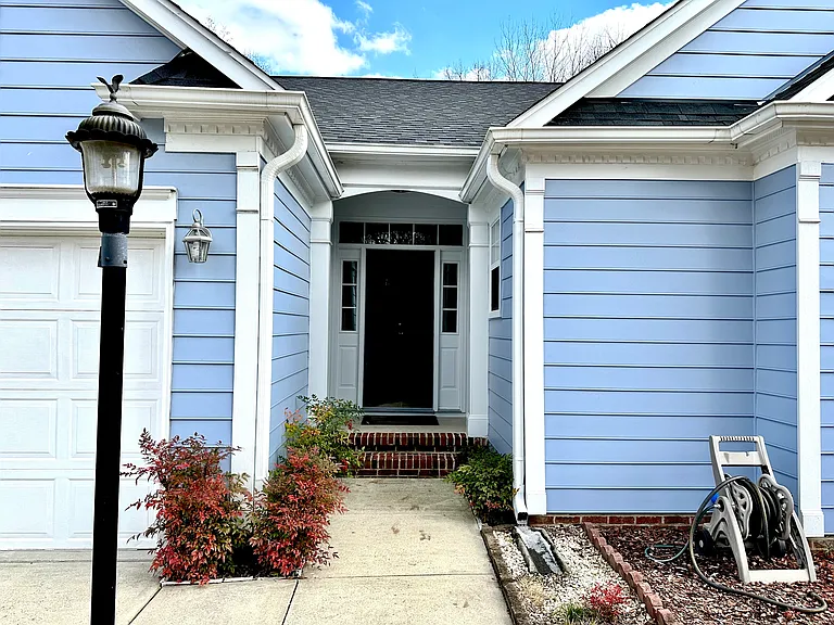 Inviting front entrance with covered porch