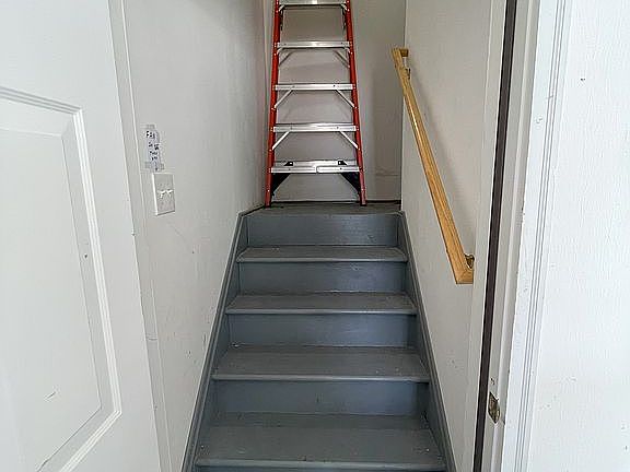 Stairs to attic in garage