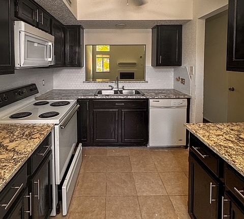 New granite counters and backsplash.