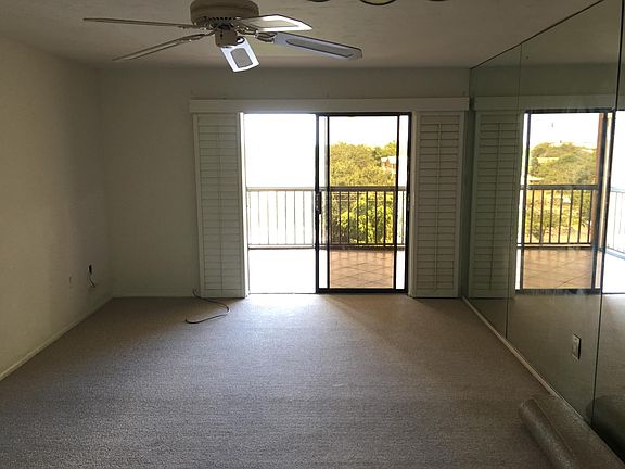 Large living room with wall mirrors 
Top floor view - fifth floor 
New carpet and new paint!