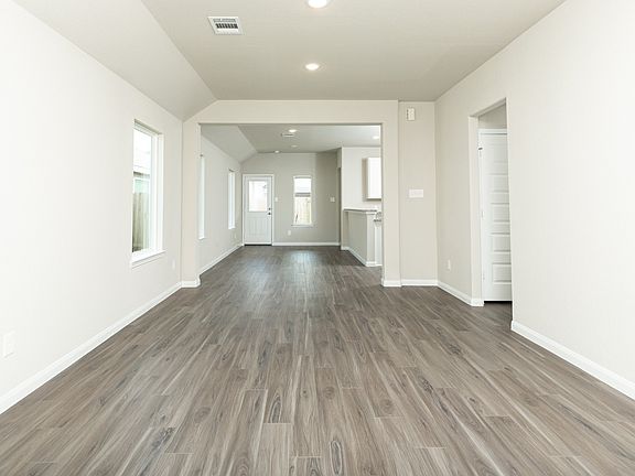 Family Room to Dining Area and Kitchen
