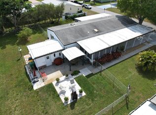 604 Amaryllis Dr, Barefoot Bay, FL 32976