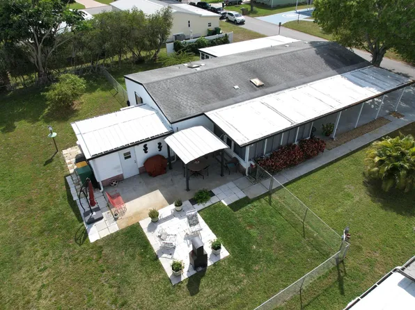 604 Amaryllis Dr, Barefoot Bay, FL 32976