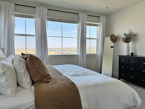 Primary bedroom with mountain view