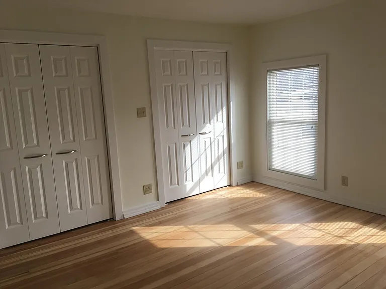 Upper level bedroom with double closets.
