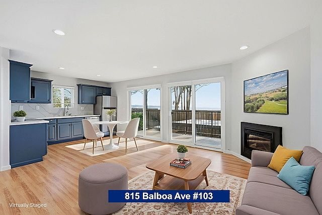 Spacious living room and kitchen area with views!