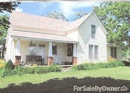 Front view. House has a nice covered front porch.