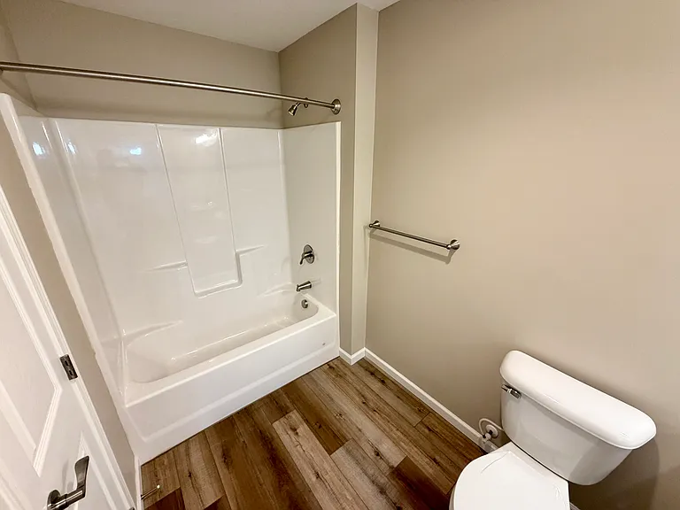 View of shower/tub in guest bathroom