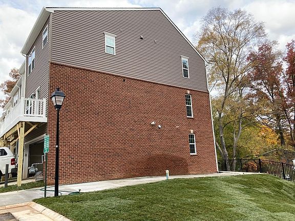 brick exterior, lawn area