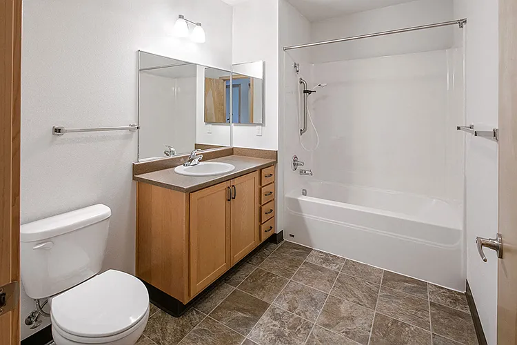 Large bathrooms with shower & tub.