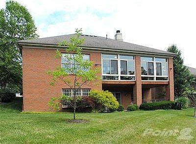 Back elevation. Enclosed porch and covered patio.