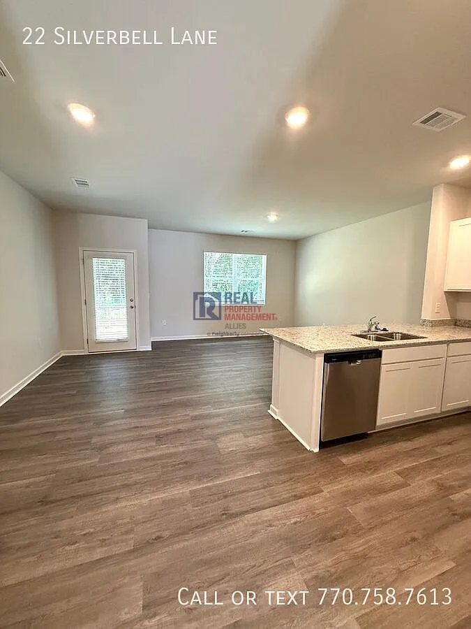 New Townhome Close to It All — Photo 3