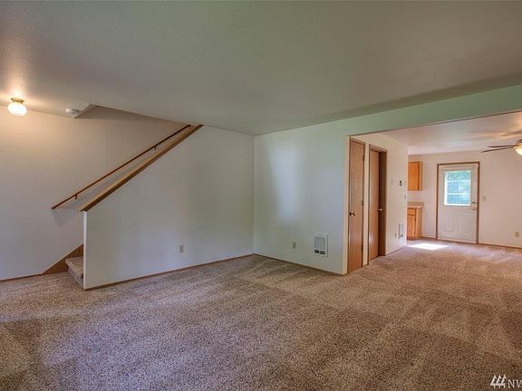 Open concept main floor with new carpet! 