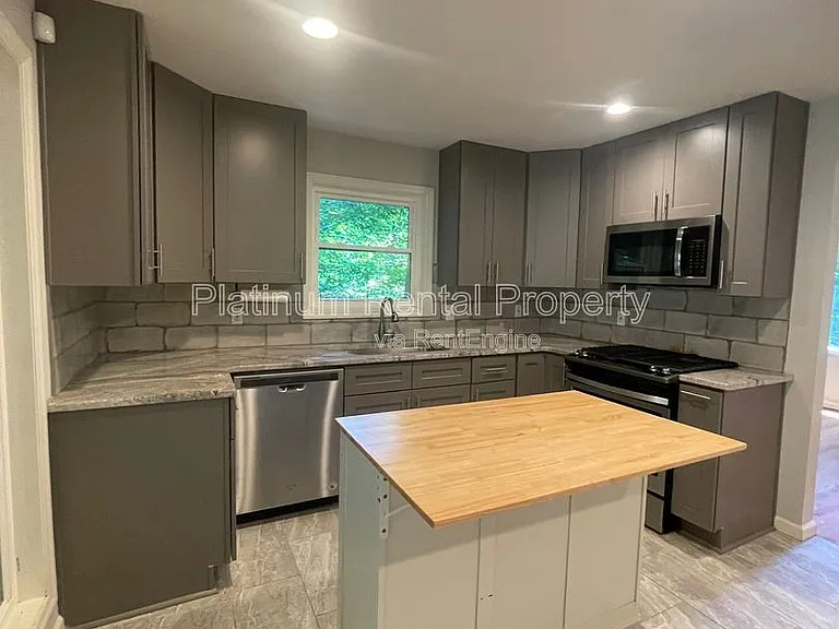 4186 Nowata Dr NE — Photo 26
