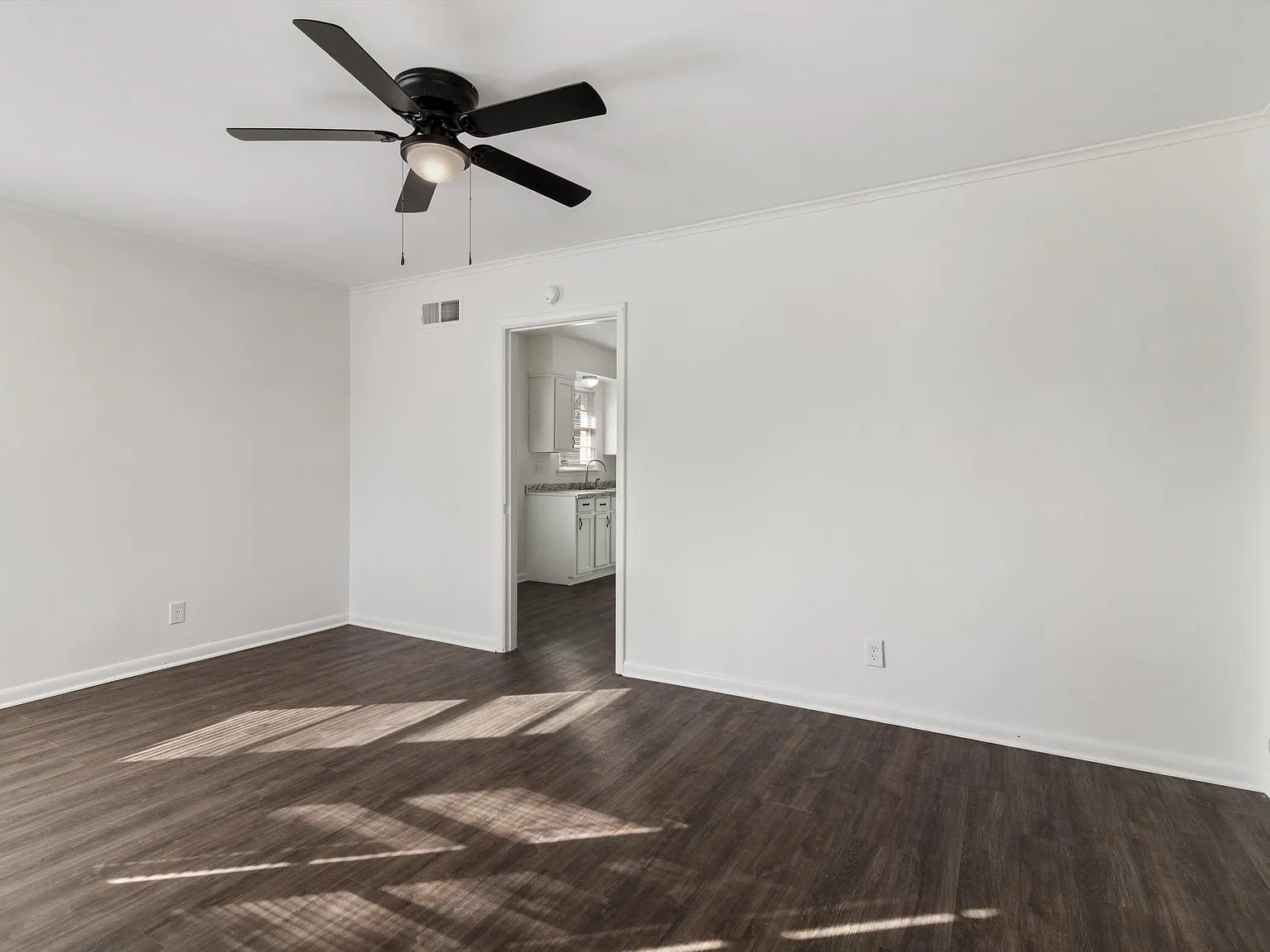 Freshly Updated 4BR White Brick Home with Carport & Fenced Yard — Photo 2