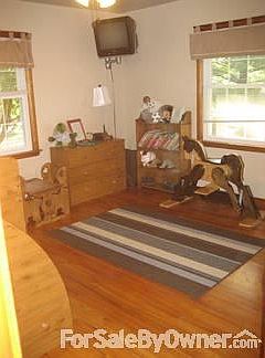 Bedroom 1 of 3
						:
						Large closet, wonderful hardwood floor, bright, 12.5 x 13 ft