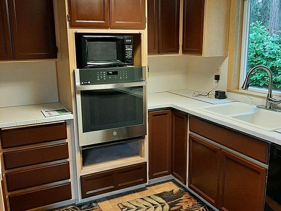 New kitchen appliances. Microwave and oven.