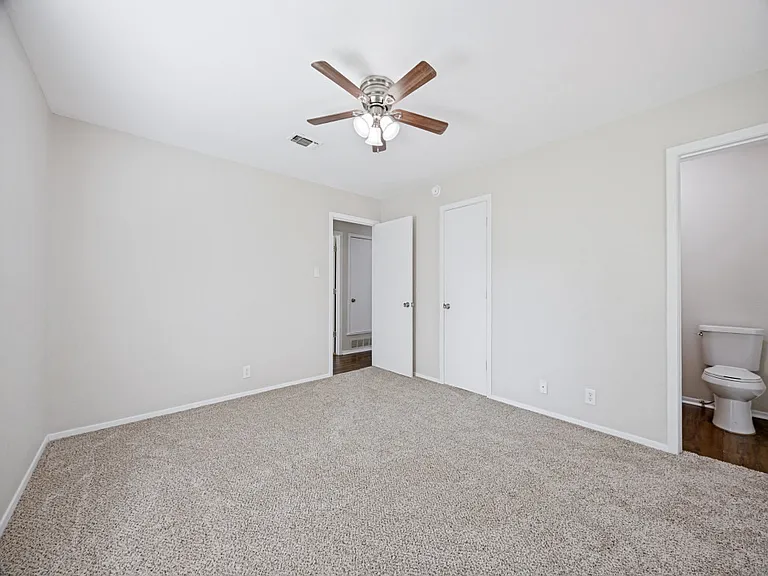 Primary bedroom. This bedroom has an ensuite half bath.