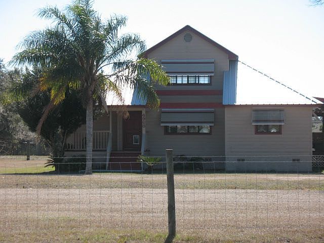 front of home with wood porch