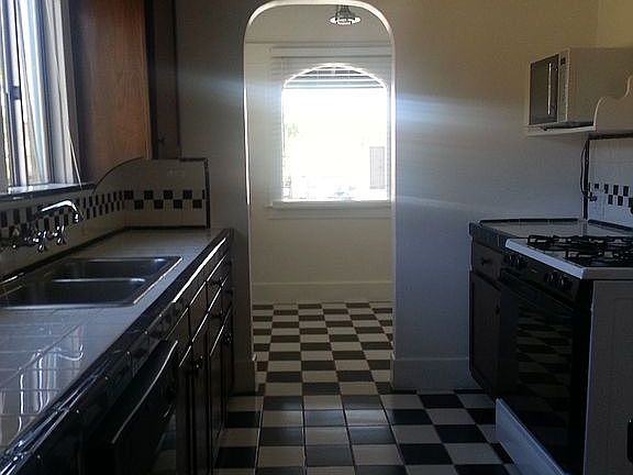 Kitchen looking into breakfast nook