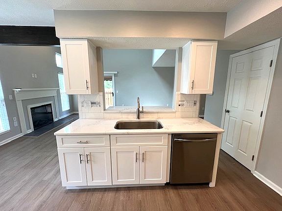Fresh cabinets, deeper sink, and a whole new kitchen vibe.
