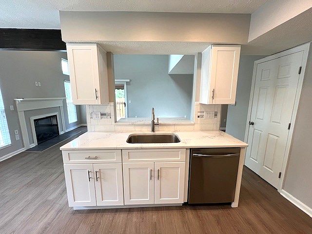 Fresh cabinets, deeper sink, and a whole new kitchen vibe.