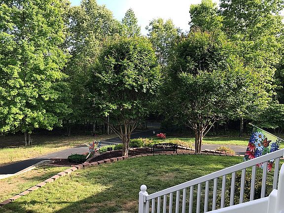 Fnt Yrd view off brick porch