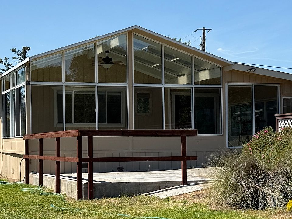 Outside patio, sunroom entrance.