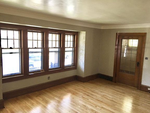 Living room and front entryway door.