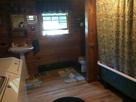 first floor full bathroom with washer/dryer