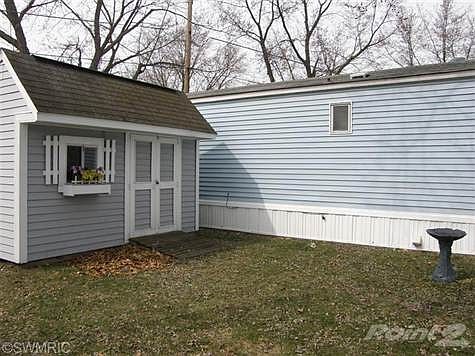Private Area to Enjoy your Yard Conveniently Located just behind the Carport