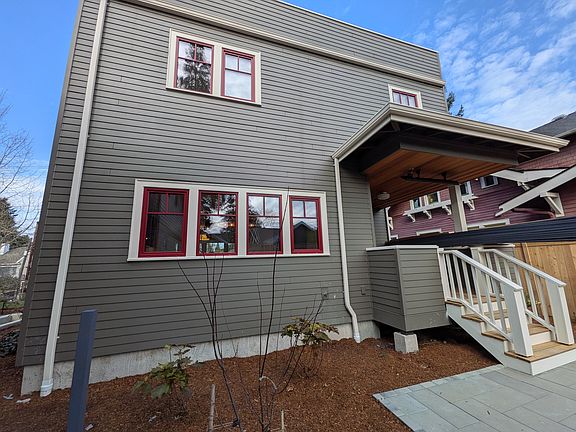 Large fenced backyard with heated outdoor deck!