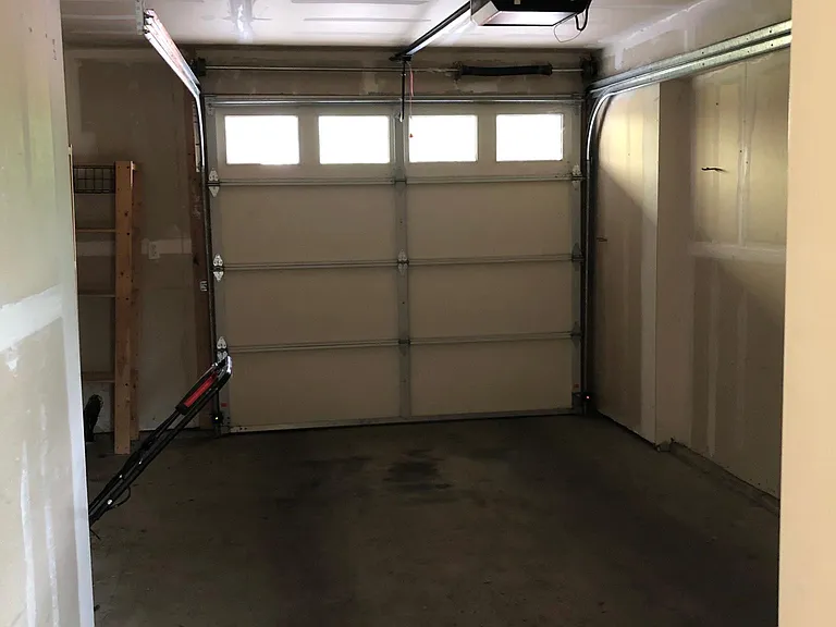 Attached garage with storage.
