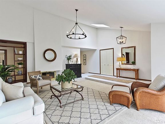 Here's one more view of the gorgeous living room. These vaulted ceilings add to the dramatic feel.