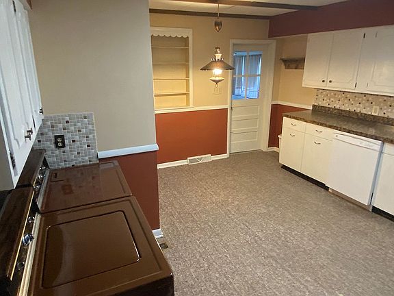 Kitchen with laundry. 