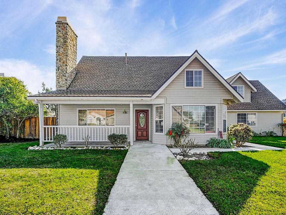 1__ Front of House
Single-family home with front porch, landscaped yard, and concrete walkway.