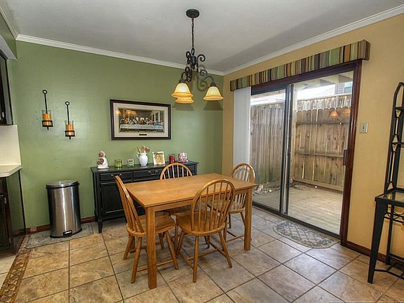 Dining area with private patio views.